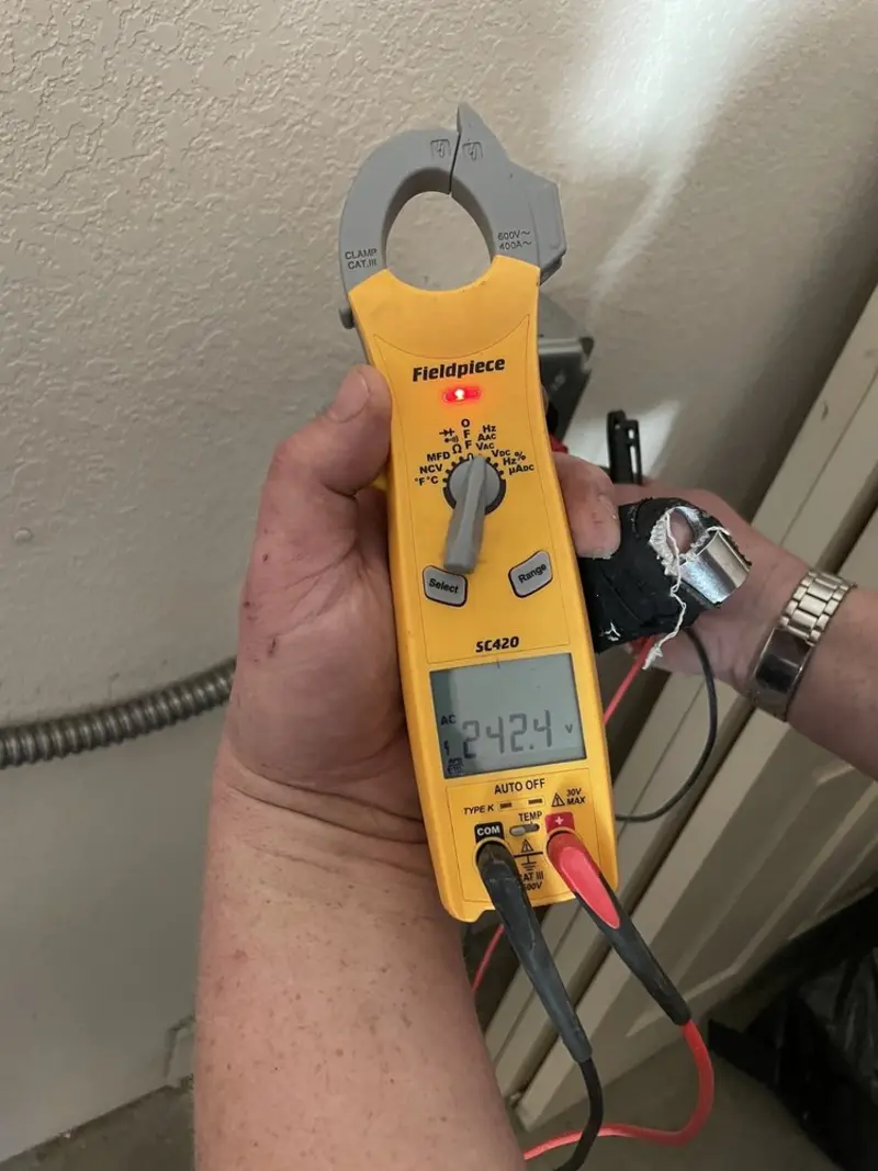 Voltage testing with clamp meter during Aluminum Wiring Replacement in Chester